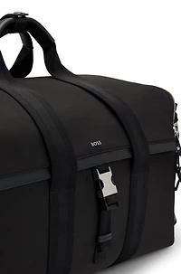 Holdall with zipped suit compartment