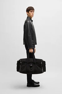 Holdall with zipped suit compartment