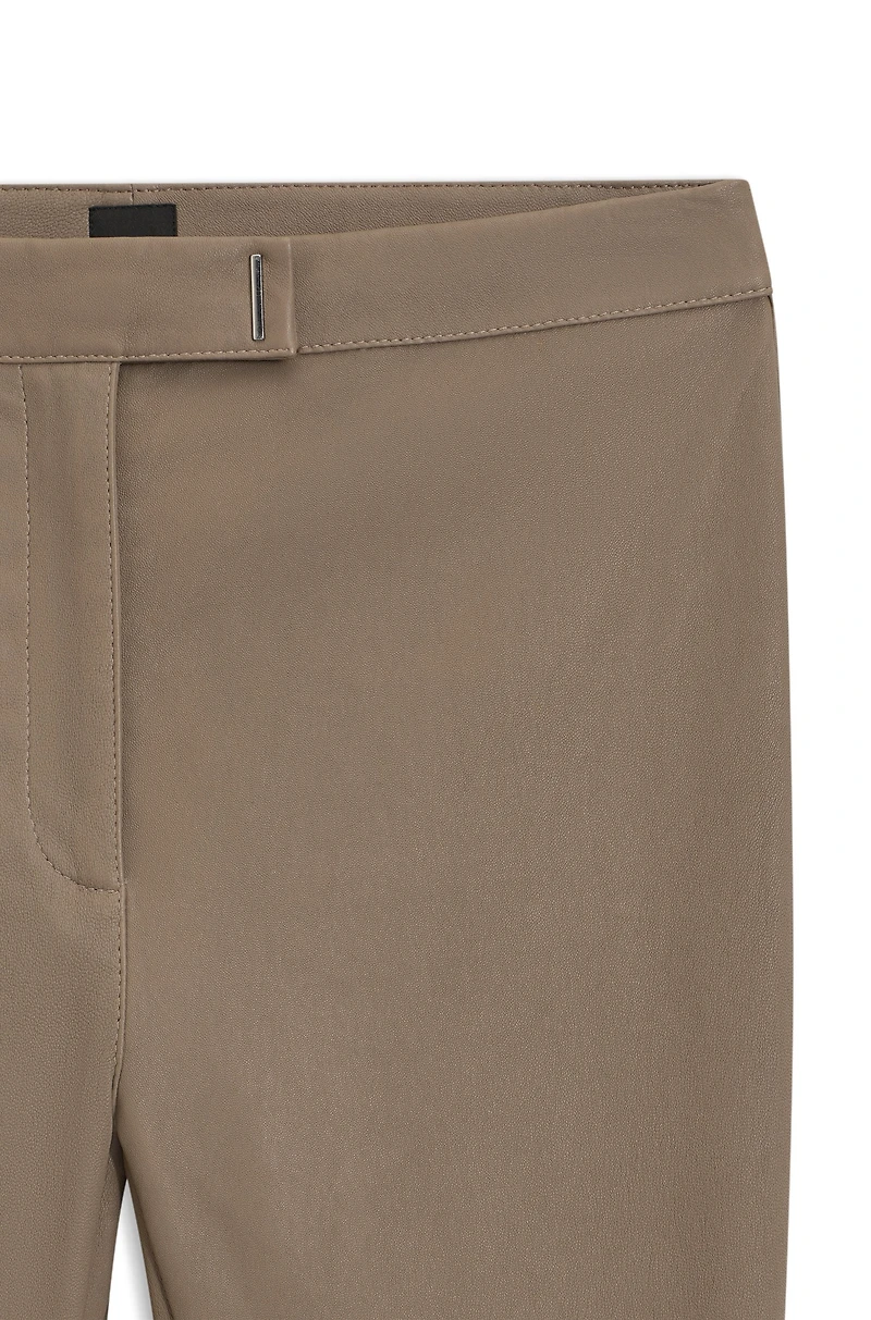 Leather leggings with logo-hook closure
