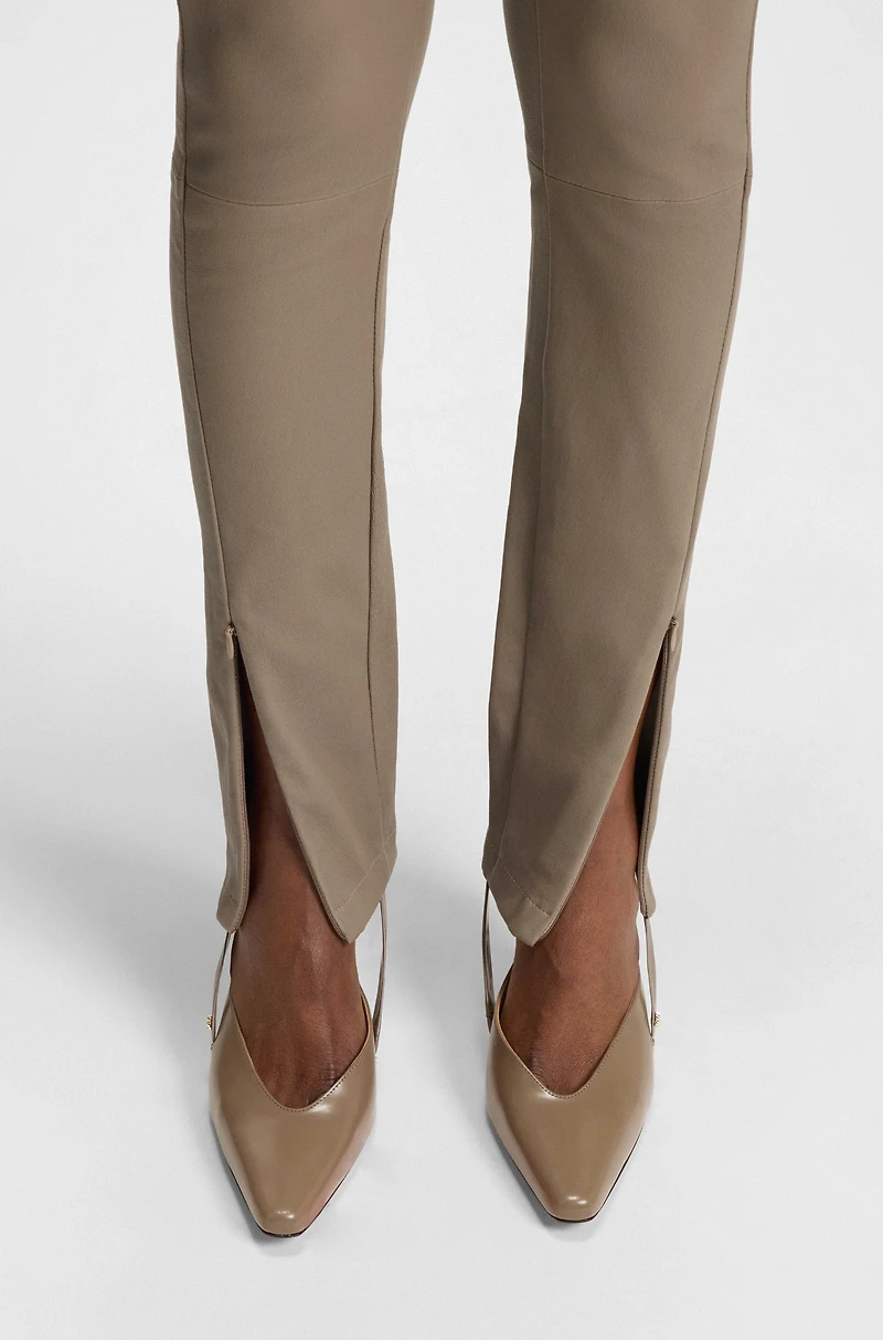 Leather leggings with logo-hook closure