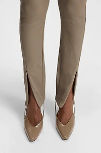 Leather leggings with logo-hook closure