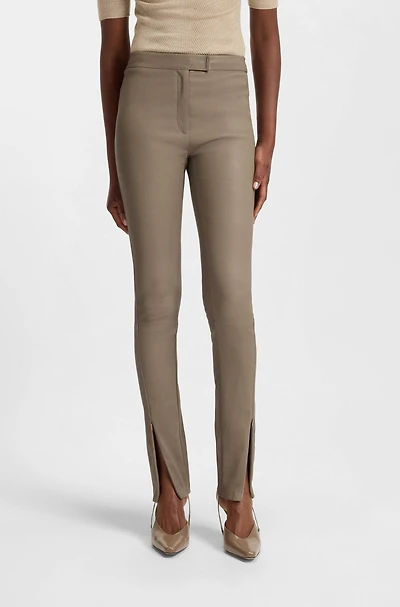 Leather leggings with logo-hook closure
