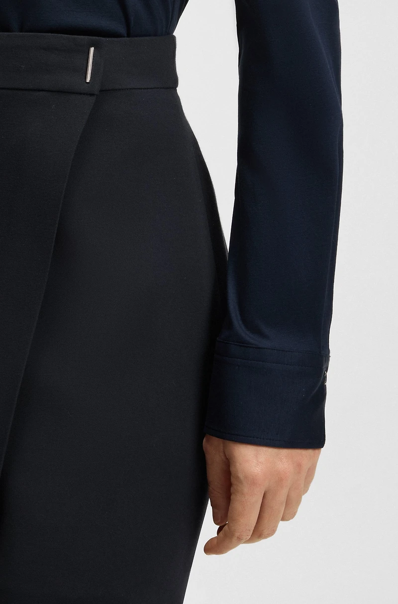 Crepe mini skirt with wrap front