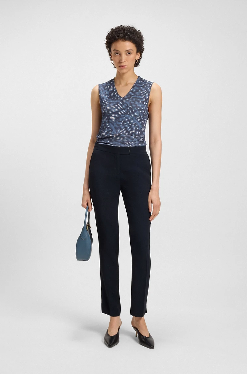 Slim-fit trousers with slit hems