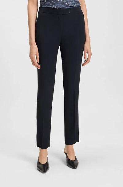 Slim-fit trousers with slit hems