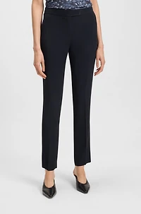 Slim-fit trousers with slit hems