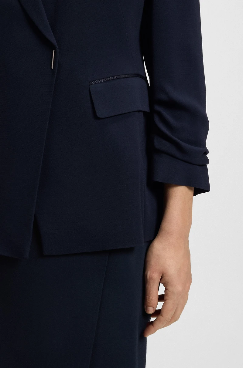 Slim-fit blazer with press-stud closure