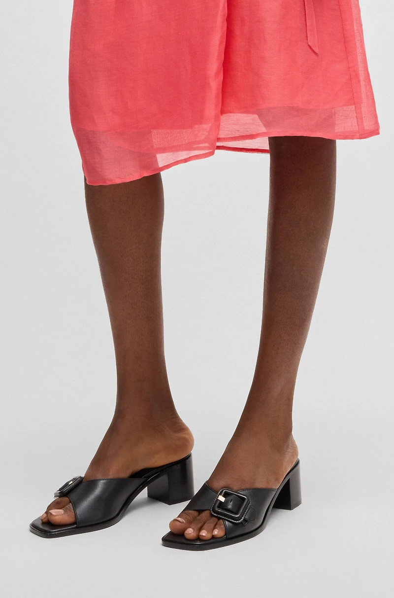 Leather mules with buckle detail