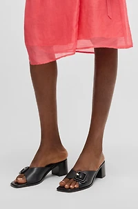 Leather mules with buckle detail
