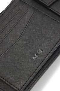 Structured trifold wallet with monogram pattern