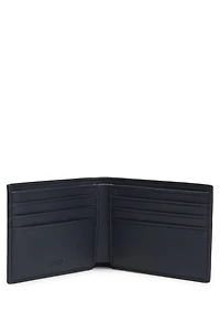 Faux-leather folding wallet with textured trim