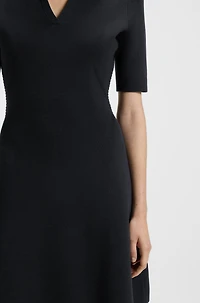 Knitted dress with skipper collar