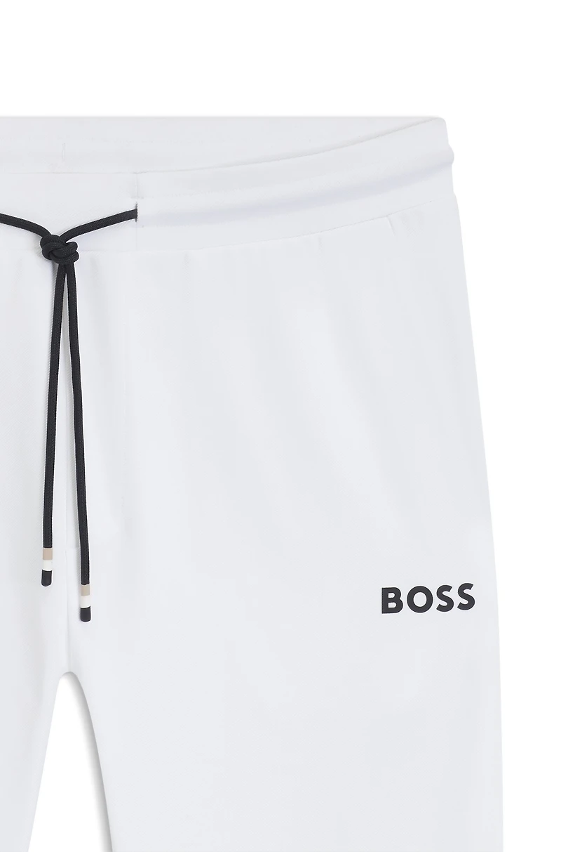 Active stretch-gabardine tracksuit bottoms with thermoregulating technology