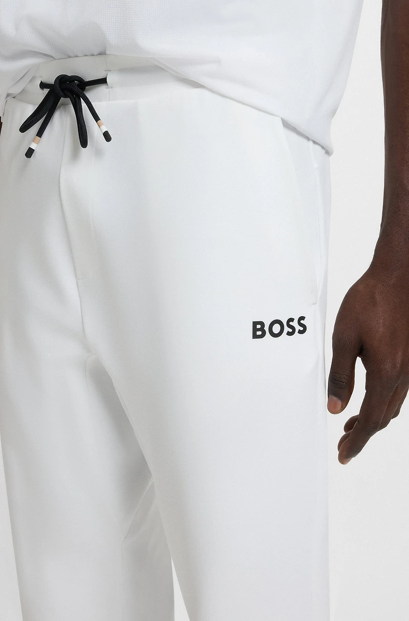 Active stretch-gabardine tracksuit bottoms with thermoregulating technology