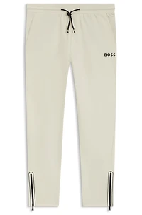 Active stretch-gabardine tracksuit bottoms with thermoregulating technology