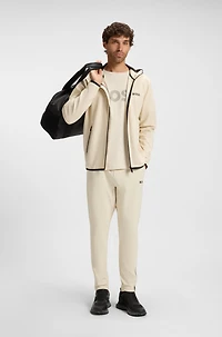 Active stretch-gabardine tracksuit bottoms with thermoregulating technology