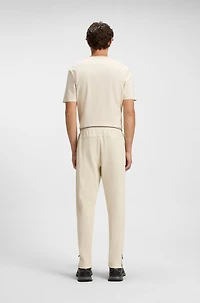 Active stretch-gabardine tracksuit bottoms with thermoregulating technology