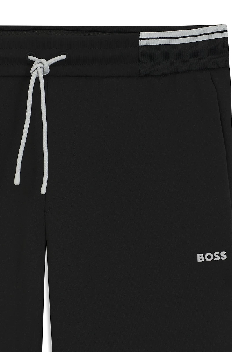 Cotton tracksuit bottoms with striped trims