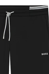 Cotton tracksuit bottoms with striped trims