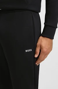 Cotton tracksuit bottoms with striped trims