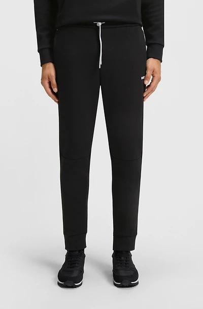 Cotton tracksuit bottoms with striped trims
