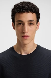 Knit sweater with mixed structures
