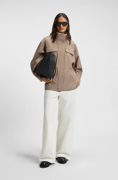 Water-repellent jacket with gathered waist