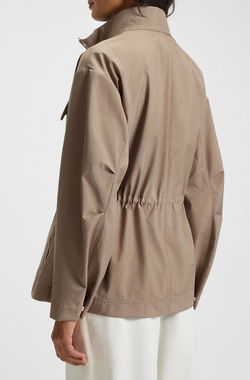 Water-repellent jacket with gathered waist
