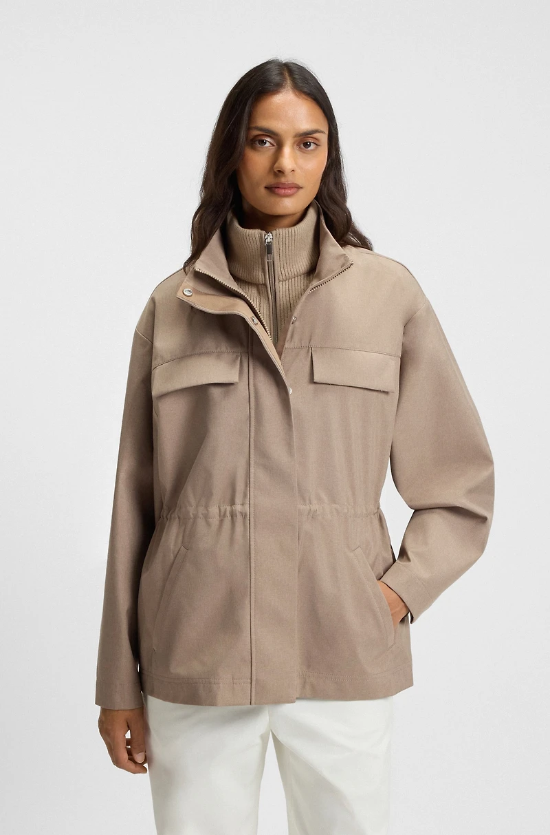 Water-repellent jacket with gathered waist