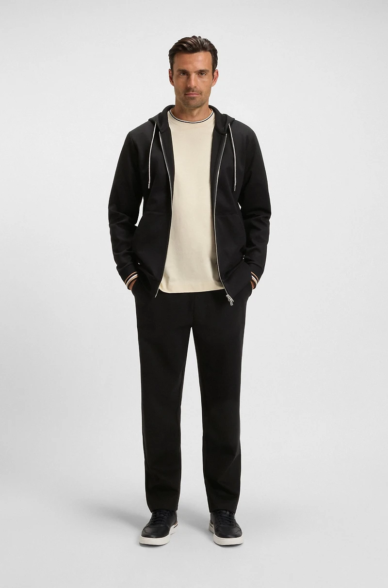 Tracksuit bottoms with patterned drawcord