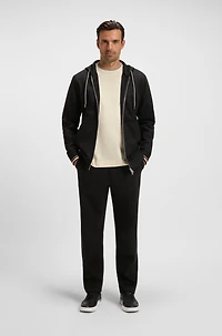 Tracksuit bottoms with patterned drawcord