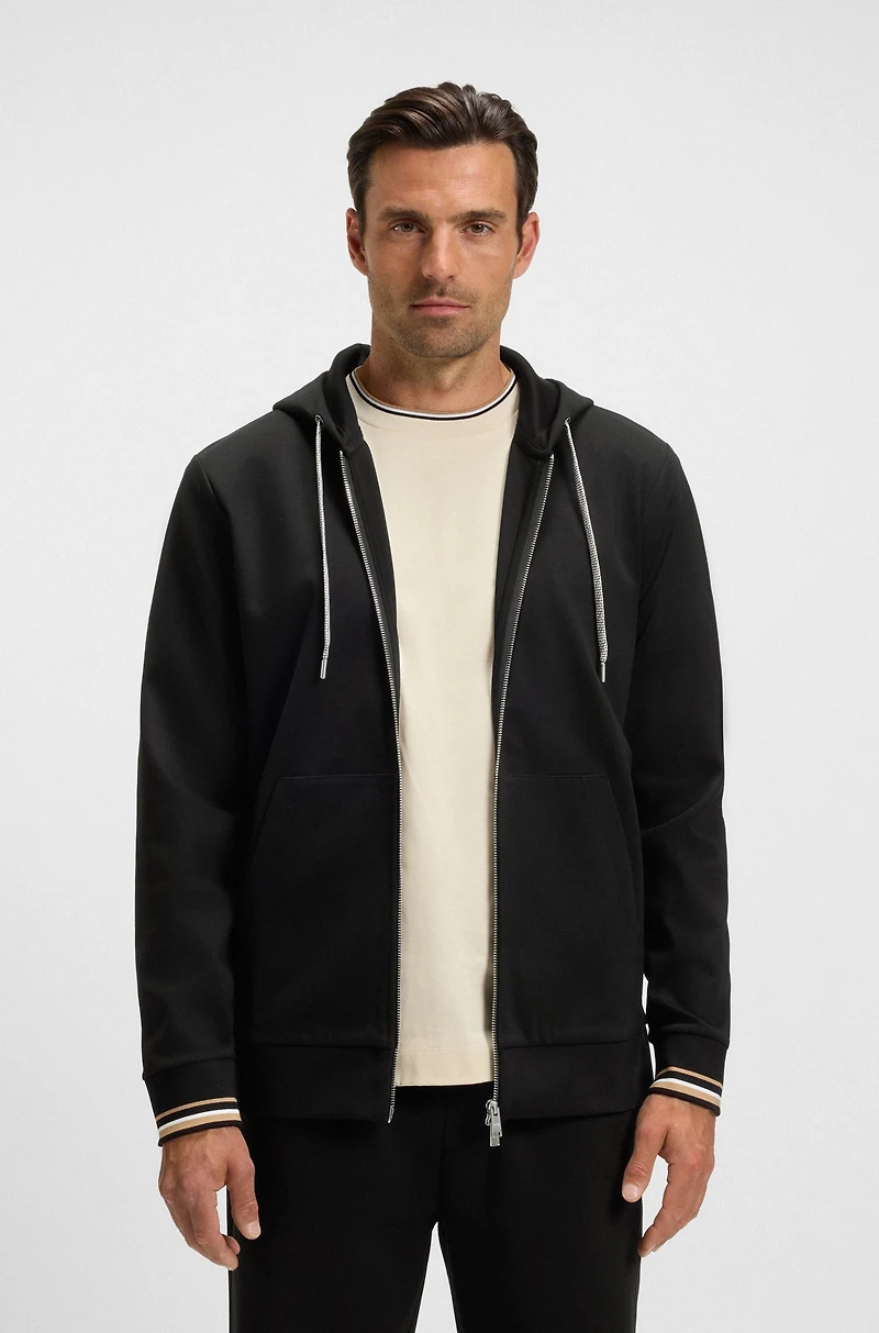 Zip-up hoodie with patterned drawcords