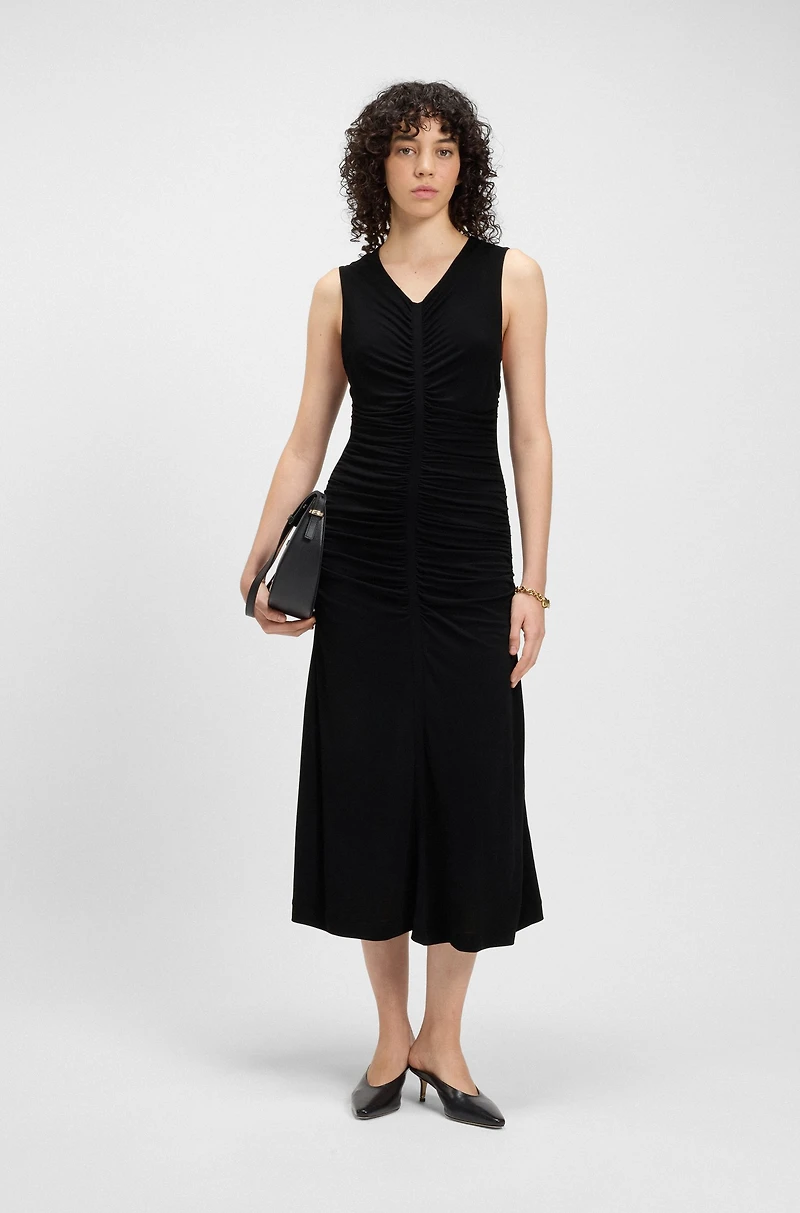 Sleeveless jersey dress with gathered details