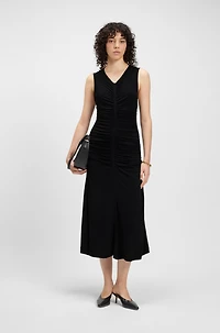 Sleeveless jersey dress with gathered details