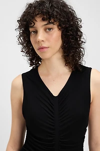 Sleeveless jersey dress with gathered details