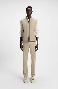 Water-repellent gilet with tonal binding