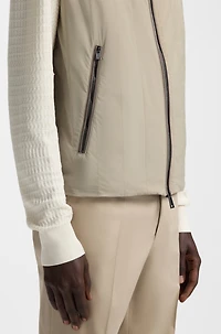 Water-repellent gilet with tonal binding