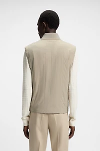 Water-repellent gilet with tonal binding