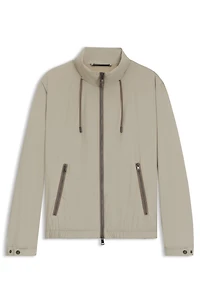 Water-repellent windbreaker with packable hood