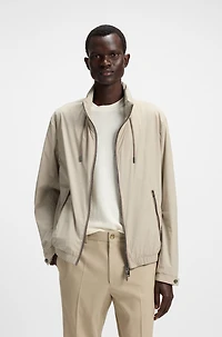 Water-repellent windbreaker with packable hood