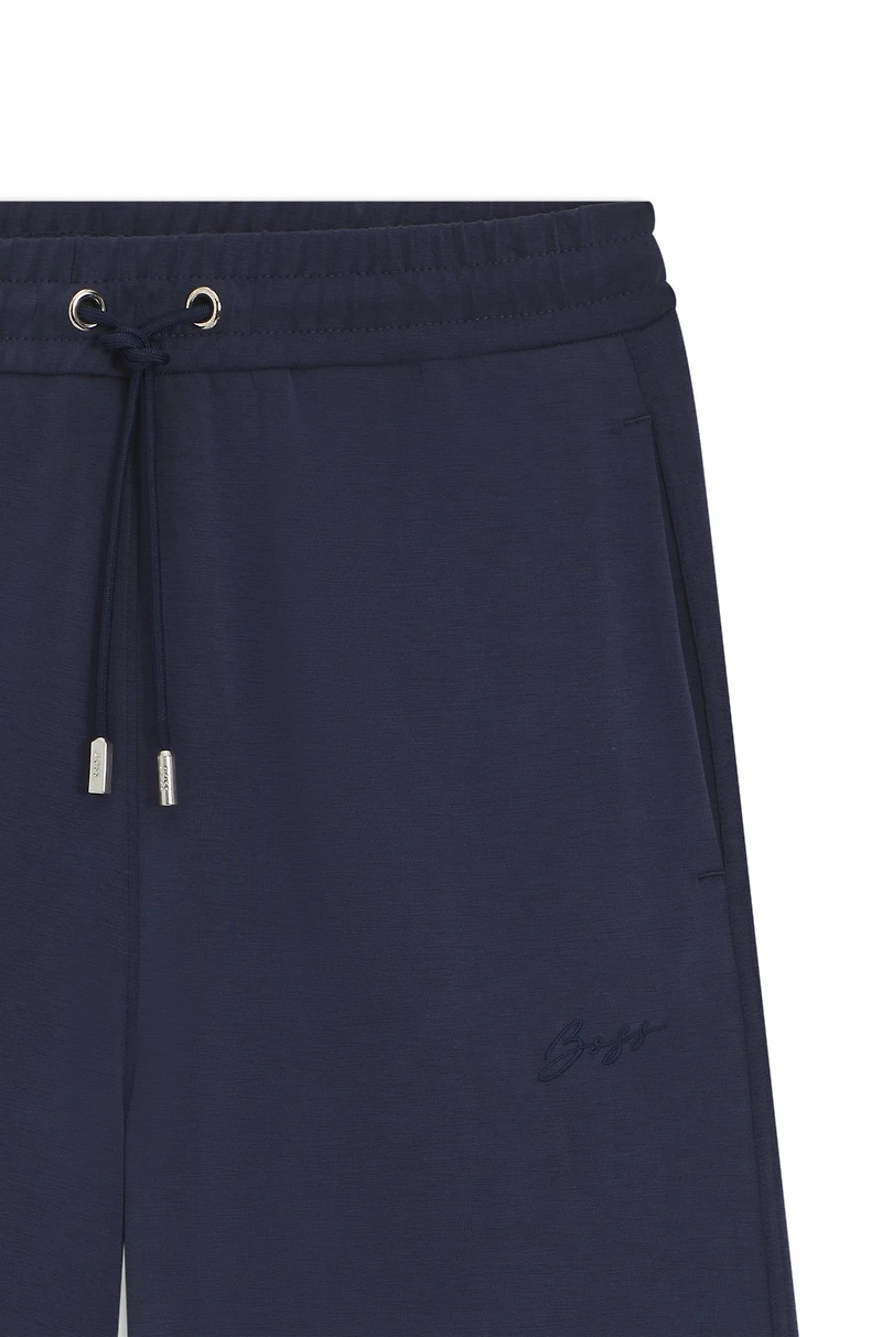 Relaxed-fit tracksuit bottoms with embroidered logo