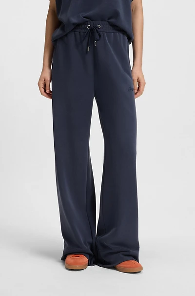 Relaxed-fit tracksuit bottoms with embroidered logo