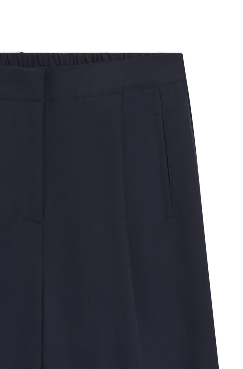 Formal trousers with pleat details
