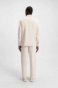 Packable relaxed-fit overshirt performance-stretch fabric