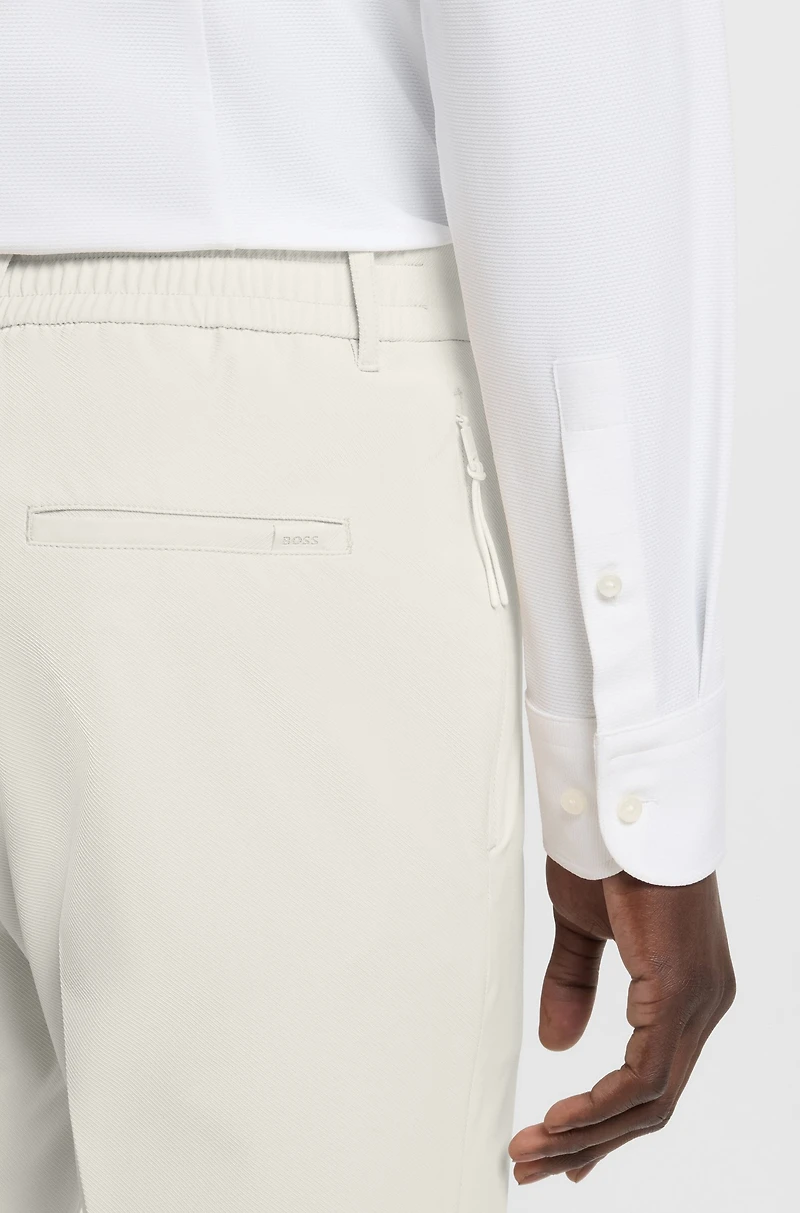 Packable slim-fit trousers performance-stretch fabric