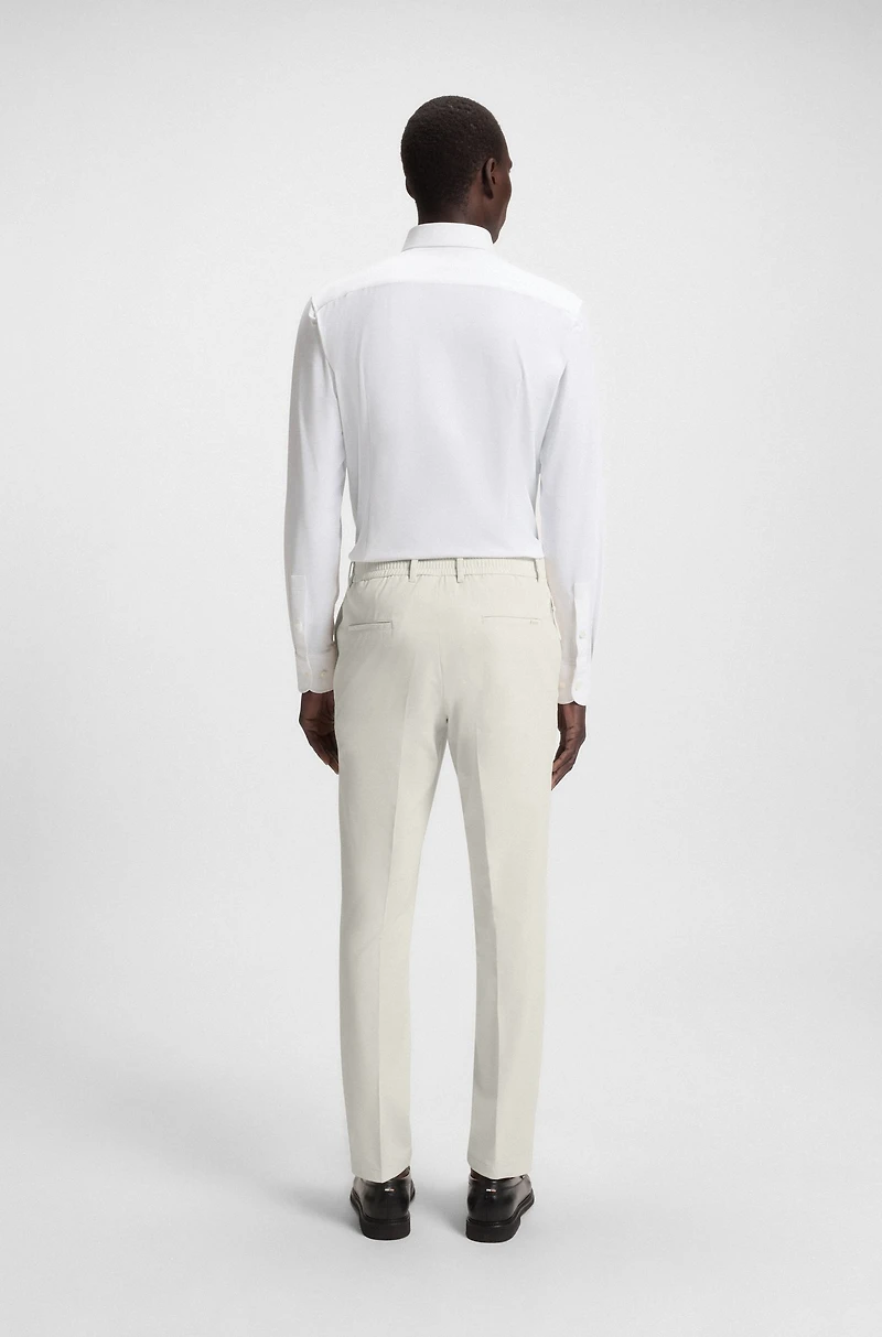 Packable slim-fit trousers performance-stretch fabric
