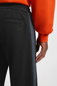 Porsche x BOSS tracksuit bottoms with side stripes