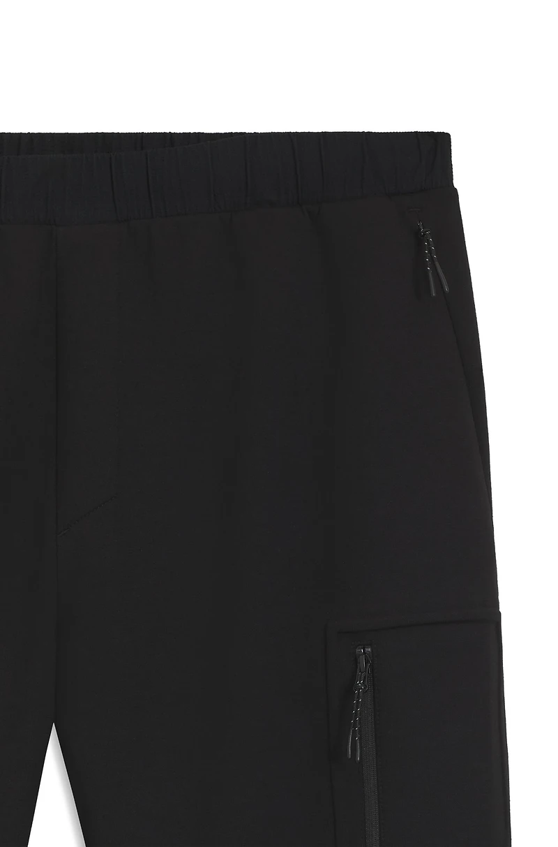 Regular-fit tracksuit bottoms with decorative reflective details