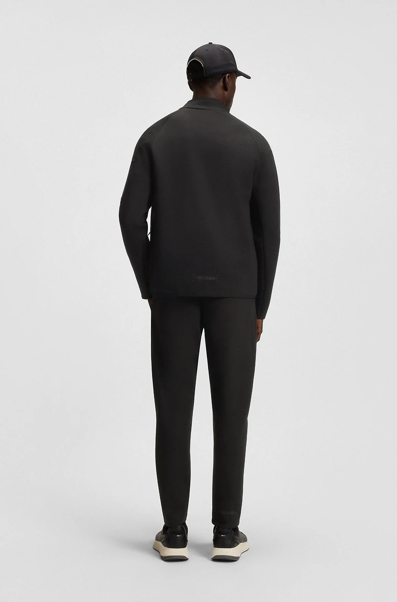 Regular-fit tracksuit bottoms with decorative reflective details