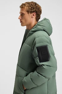 Down-filled long jacket with water-repellent finish